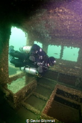 Sidemount Diver practicing skills to  enter wreck at the ... by David Gilchrist 